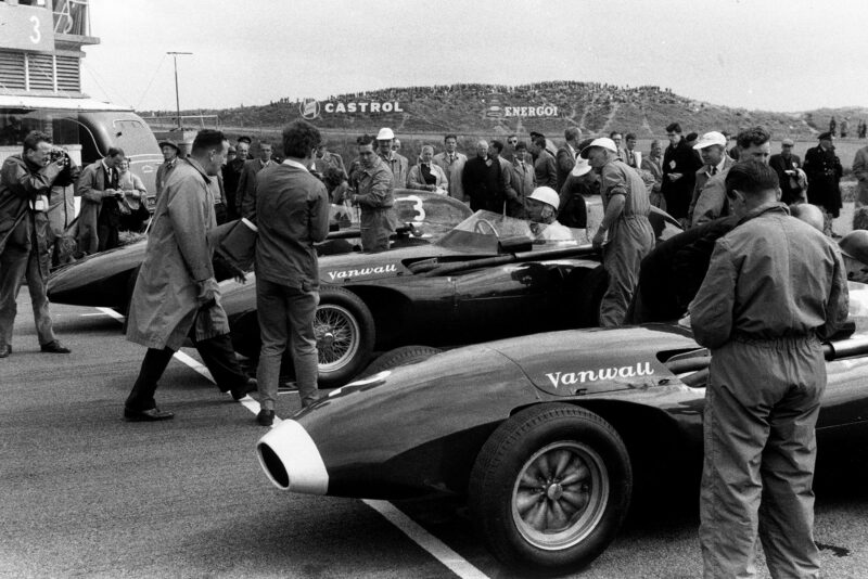 Vanwall front row: Tony Brooks, Vanwall VW7, Stirling Moss, Vanwall VW10, and Stuart Lewis-Evans, Vanwall VW5, on the grid before the start of the race.