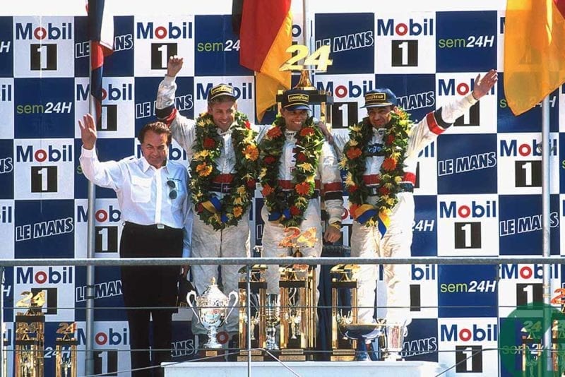 Michele Alboreto celebrates on 1997 Le Mans podium with Porsche team mates Stefan Johansson and Tom Kristensen