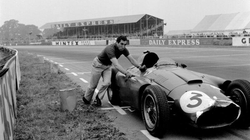 The British Grand Prix; Silverstone, July 14, 1956. Alfonso de Portago pushing his Ferrari-Lancia around Woodcote Corner to the finish line. (Photo by Klemantaski Collection/Getty Images)