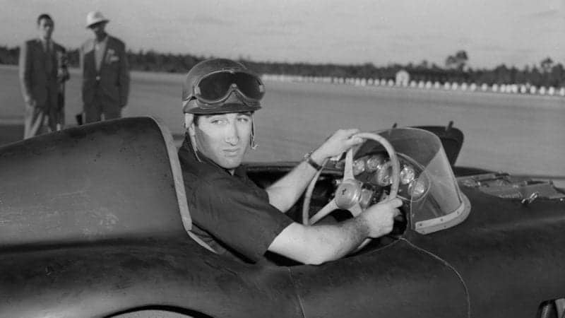 Original Caption) The Marquis de Portago of Spain sits in his three liter Ferrari after winning the 30 lap, 105 mile auto race at Windsor Field Course. The following day the Marquis placed second in the 210 mile Nassau Trophy Race, while America's Matsen Gregory of St. Louis, Mo., won; and the Baron Huschke von Hanstein of Germany came in third.