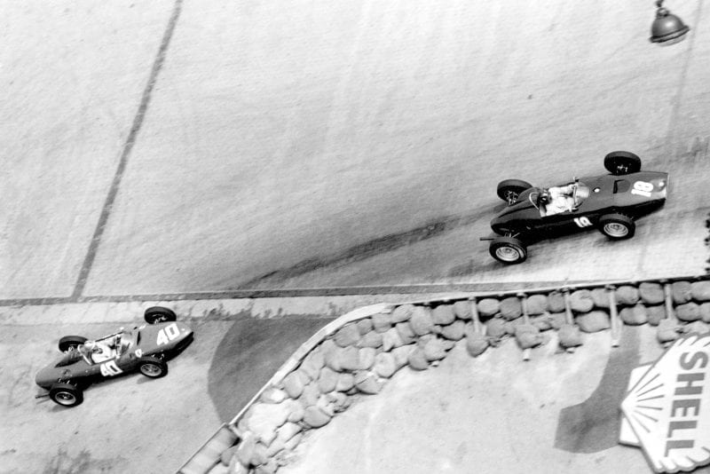 Graham Hill in a BRM P48/57-Climax leads Wolfgang von Trips driving a Ferrari Dino 156.