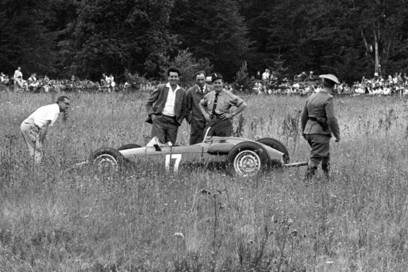 Graham Hill's BRM P48/57, retired after skidding off the track.