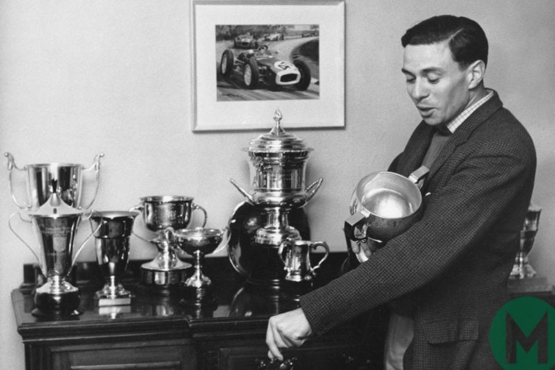 Jim Clark shows his trophies at home