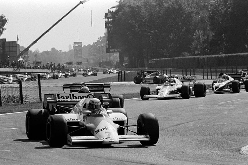 Alain Prost in a McLaren MP4/2 leads all the field except the pole sitter on the warm up lap. He retired from the race on lap 4 with a blown engine..
