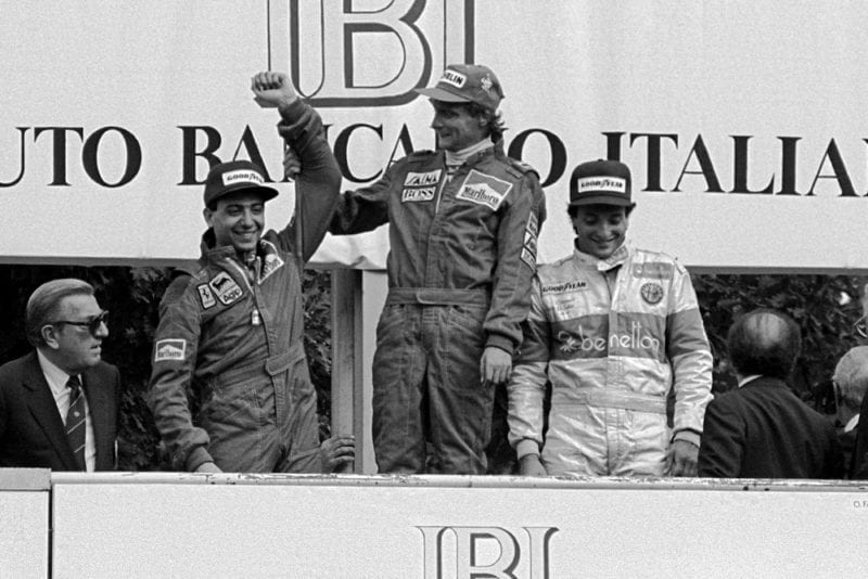 (L to R): Michele Alboreto, second; Niki Lauda, winner and Riccardo Patrese, third on the podium.