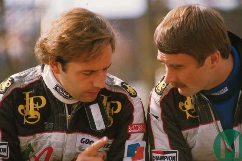 De Angelis and Mansell confer during 1984 Austrian GP weekend