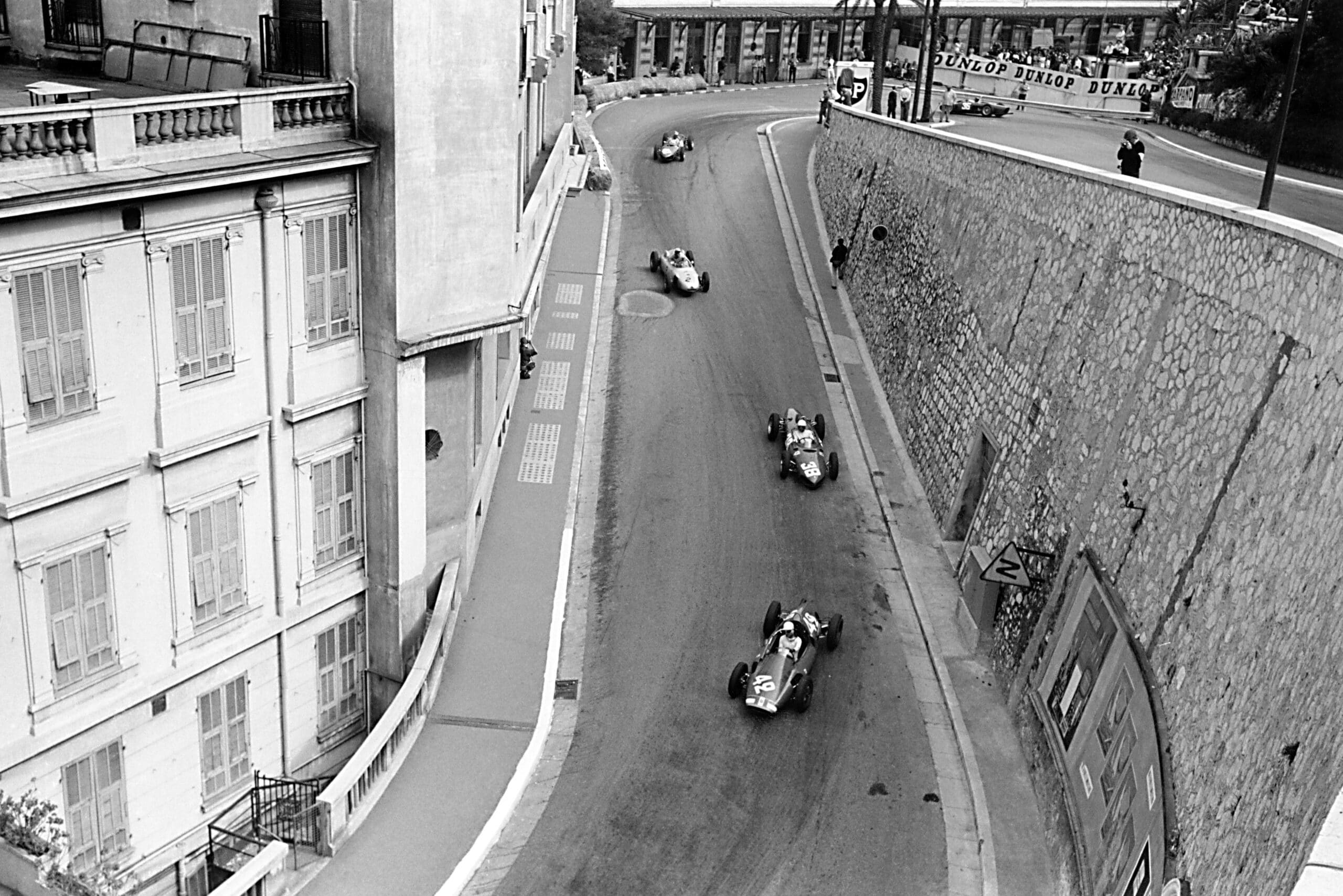 Maurice Trintignant (Cooper T51-Maserati) leads Phil Hill (Ferrari 156), Jo Bonnier (Porsche 787), Wolfgang von Trips and Richie Ginther (both Ferrari 156) out of the Old Station Hairpin.