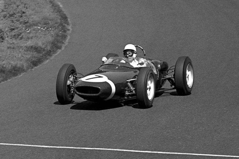 Race winner Stirling Moss wiht his Lotus 18/21 dominated the race.