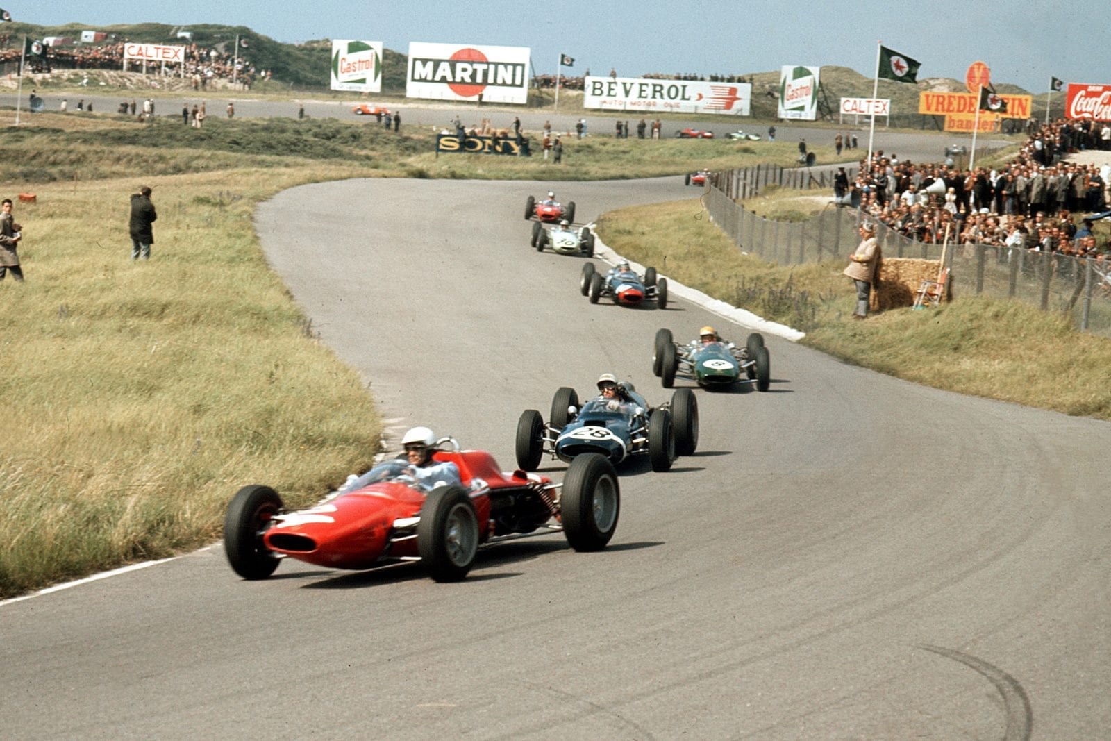 Phil Hill in an ATS 100 leads Jo Bonnier in a Cooper T60 Climax, Trevor Taylor in a Lotus 25 Climax, Chris Amon in a Lola Mk4A Climax and Innes Ireland driving a BRP 1-BRM.