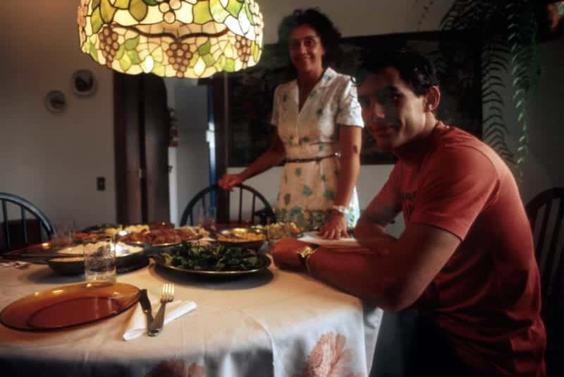 Ayrton Senna sitting down to lunch with his mother Neide Brazil 1984