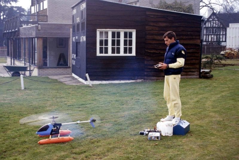 Ayrton Senna flies his model helicopter at home in Esher Surrey