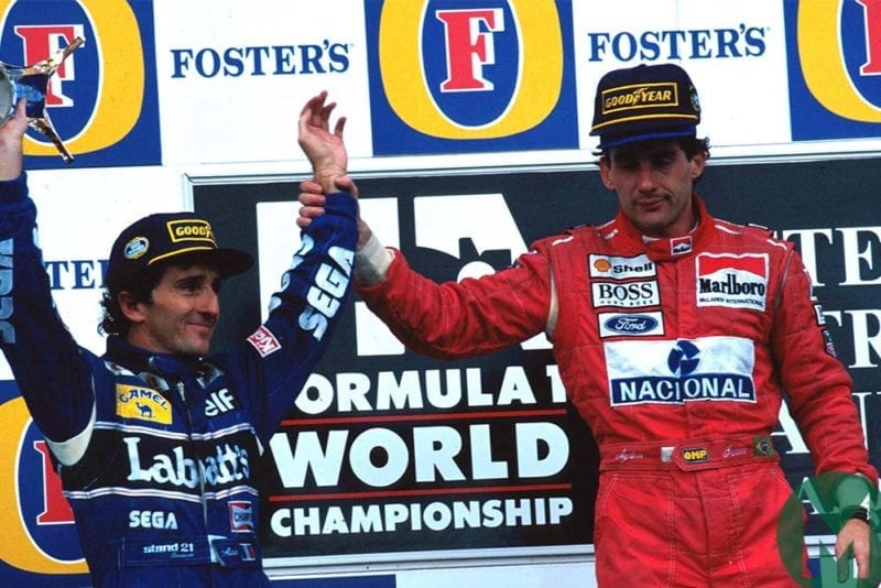 Ayrton Senna holds Alain Prost's arm aloft at 1993 Australian Grand Prix