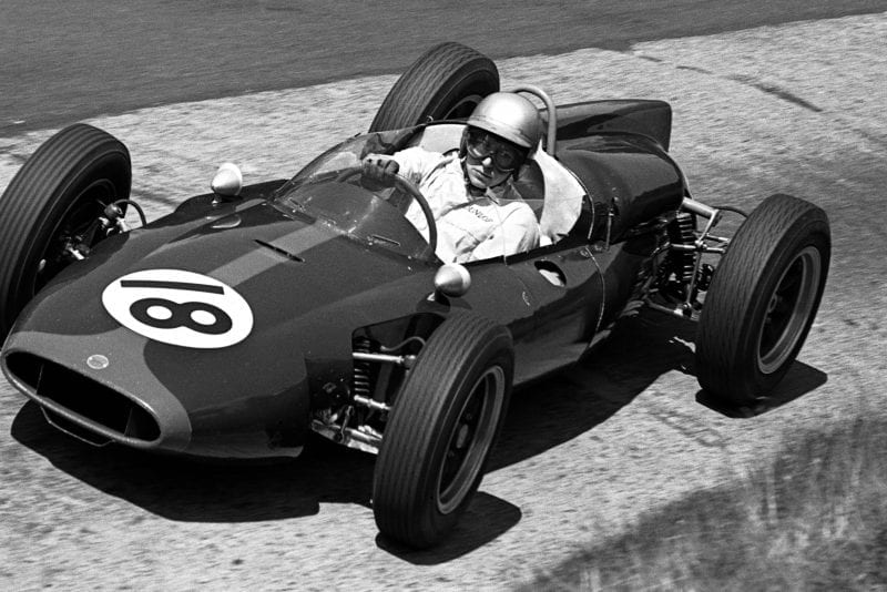 John Surtees driving a Cooper T53 at the Karussel.