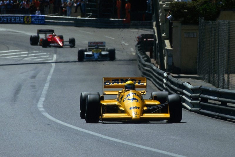Ayrton Senna leads in his Lotus 99T.
