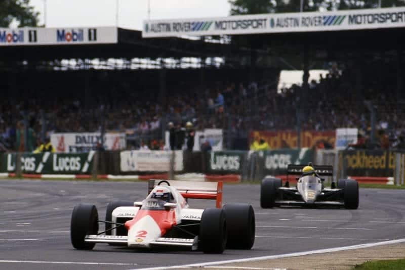 Alain Prost (McLaren MP4/2B) leads Ayrton Senna (Lotus 95T).