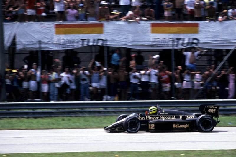 Ayrton Senna waves to his fellow countrymen after finishing second in the opening race of the season.