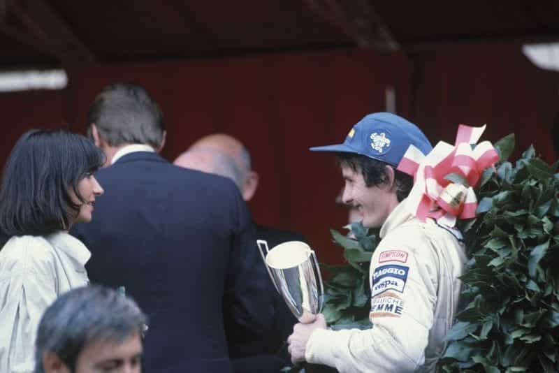 Joann and Gilles Villeneuve on the podium at 1981 Monaco Grand Prix