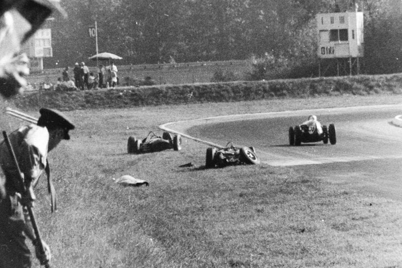 The aftermath of the accident between Wolfgang von Trips (Ferrari Dino 156) and Jim Clark (Lotus 21-Climax). Von Trips suffered fatal injuries in the accident.