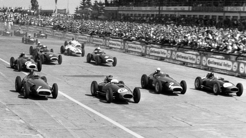 Juan Manuel Fangio, Mike Hawthorn, Jean Behra, Peter Collins aloingside each other at 1957 German Grand Prix