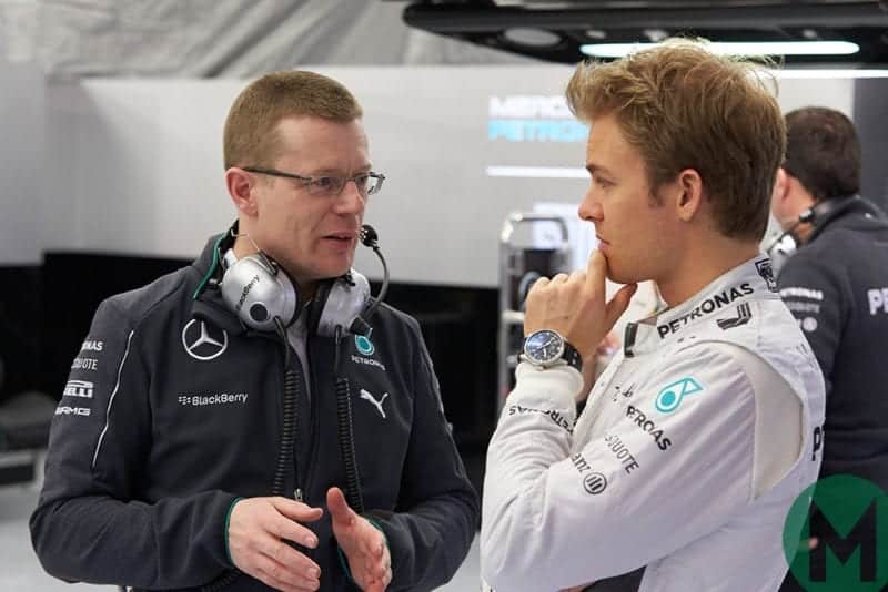 Andy Cowell talks to Nico Rosberg during Mercedes testing