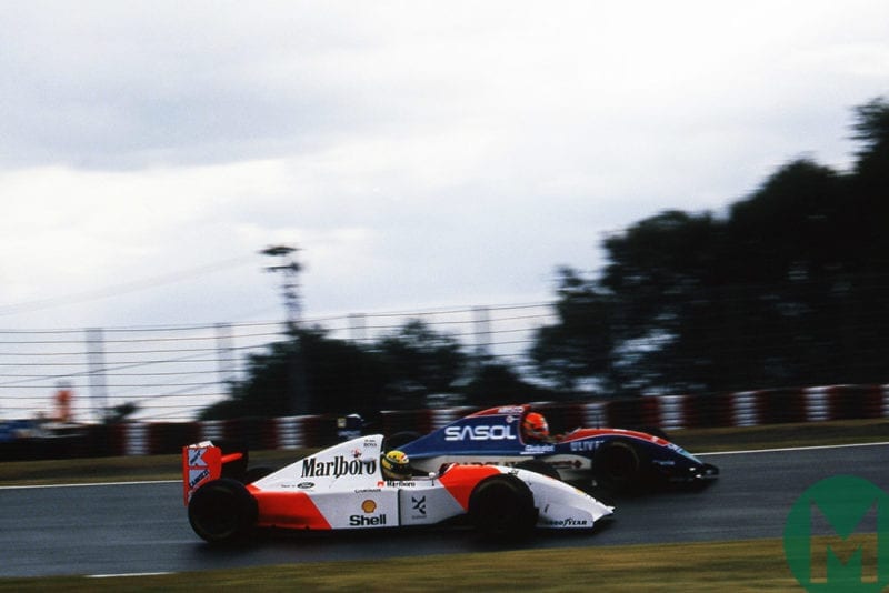 Ayrton Senna overtakes Eddie Irvine at 1993 Japanese Grand Prix