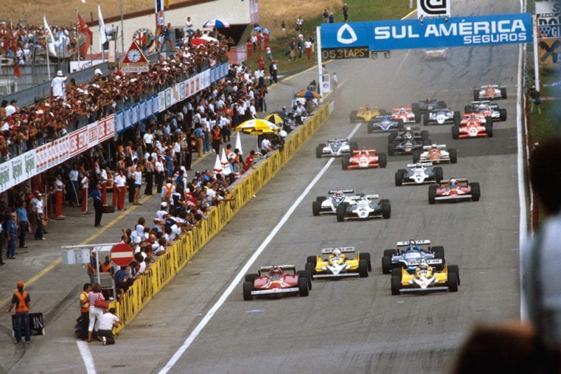 Alain Prost (Renault RE30) leads Gilles Villeneuve (Ferrari 126CK) Rene Arnoux (Renault RE30) and Jacques Laffite (Ligier JS17 Matra) at the start.