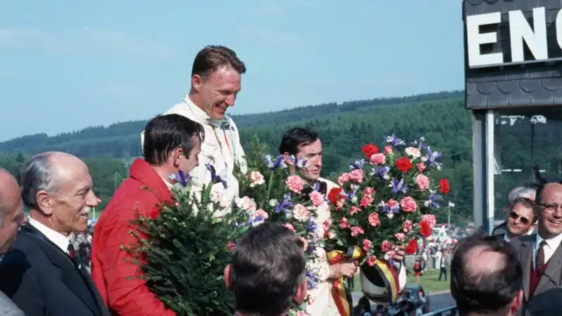 Dan-Gurney-on-the-podium-after-winning-the-1967-Belgian-GP