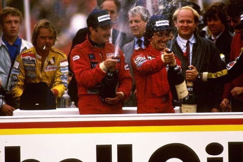 Winner Nigel Mansell (L) and Alain Prost (R) on the podium.