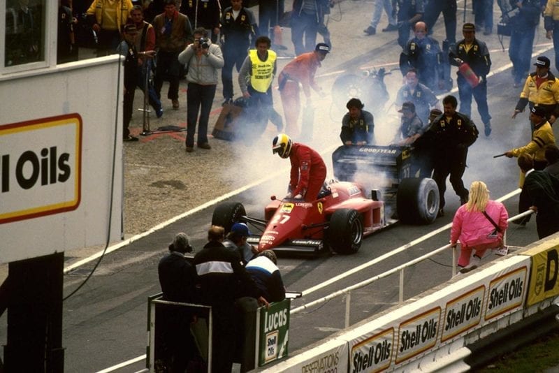 Michele Alboreto's Ferrari 156/85 goes up in smoke.