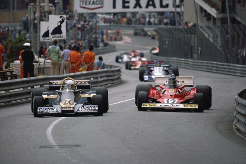 Jody Scheckter (Wolf) dices with Carlos Reutemann (Ferrari) at the 1977 Monaco Grand Prix.