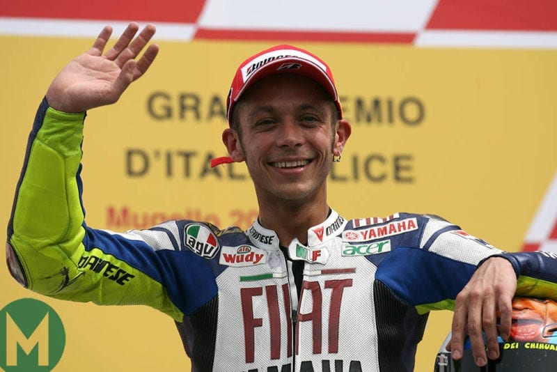 Valentino Rossi greets fans on podium at 2008 Mugello MotoGP Italy