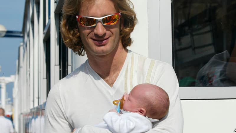 Jarno Trulli with baby son Enzo in 2005