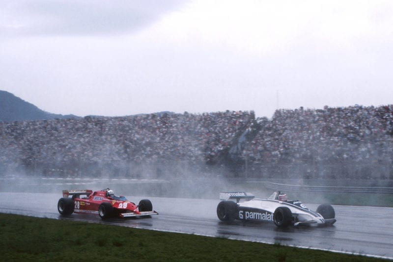 Hector Rebaque in a Brabham BT49C, leads Didier Pironi in hs Ferrari 126CK.