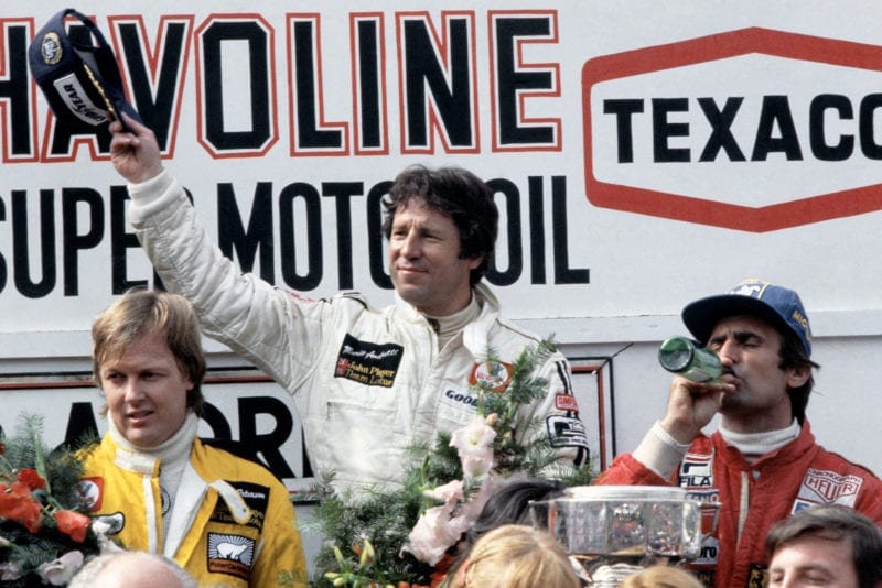 Mario Andretti (Lotus) acknowledges the crowd after winning the 1978 Belgian Grand Prix, Zolder.