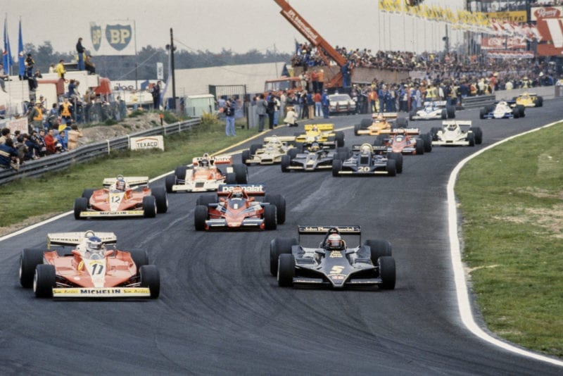 Mario Andretti (Lotus) and Carlos Reutemann (Ferrari) contest the lead into the first corner of the 1978 Belgian Grand Prix, Zolder.