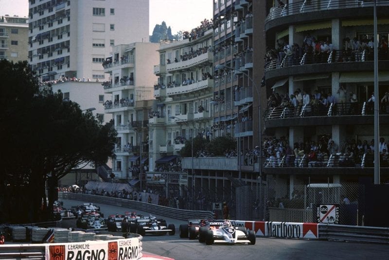 The start, Nelson Piquet (Brabham) leads from Gilles Villeneuve (Ferrari) and Nigel Mansell (Lotus).