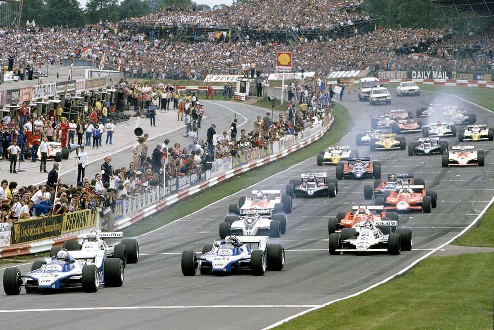 Didier Pironi leads team mate Jacques Lafitte (Both Ligier JS11/15 Ford's), Alan Jones, Carlos Reutemann (Both Williams FW07B's), Nelson Piquet (Brabham BT49 Ford) and Bruno Giacomelli (Alfa Romeo 179) at the start.