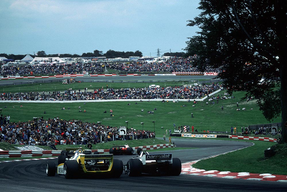 Rene Arnoux in a Renault RE24 battles with Hector Rebaque in his Brabham BT49.
