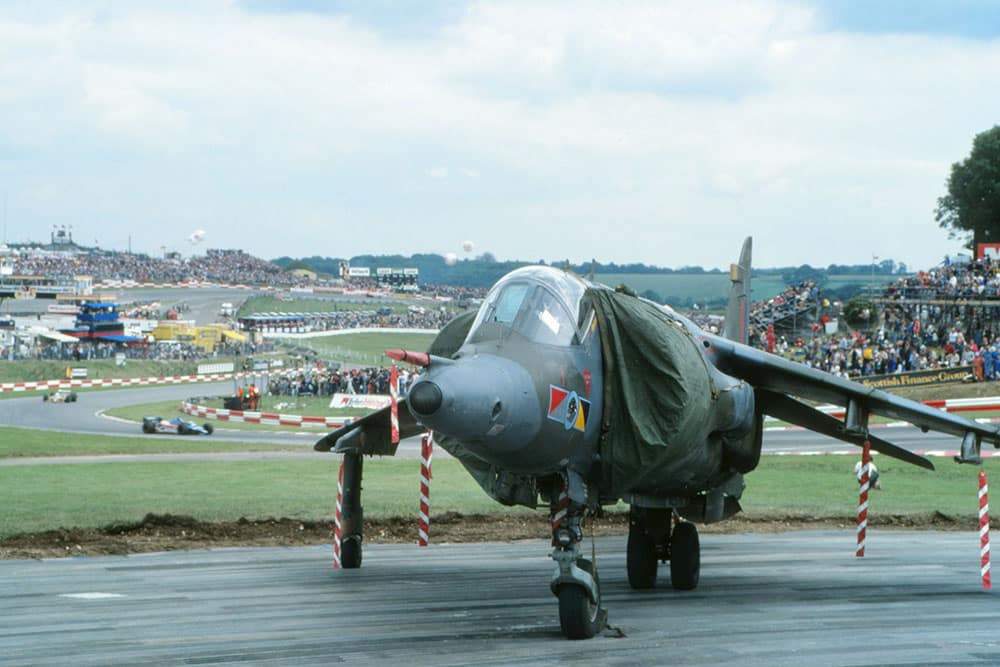 The  RAF Harrier of Flt. Lt. Dudley Carvell parked on the inside of Clearways corner after wowing the crowd during a pre-race display.