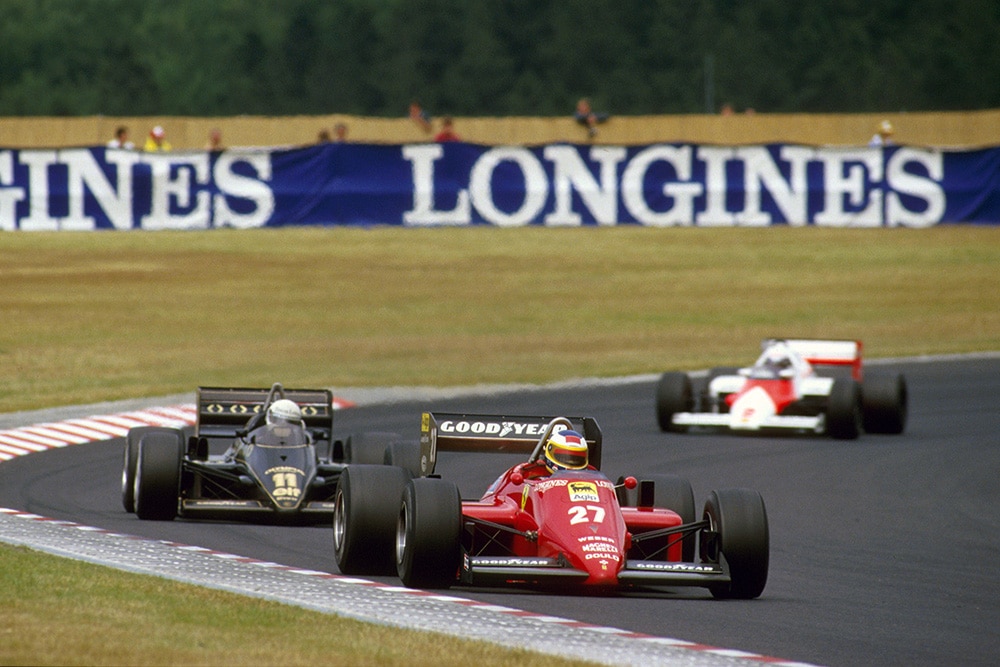 Michele Alboreto (Ferrari 156/85) leads Elio de Angelis (Lotus 97T Renault) and Alain Prost (McLaren MP4/2B TAG Porsche).