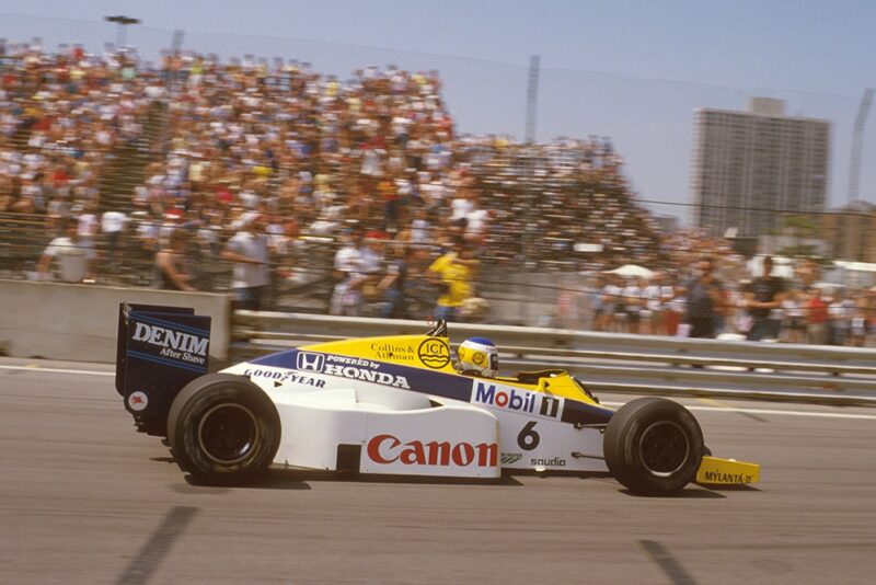 Keke Rosberg leading in his Williams FW10 Honda.