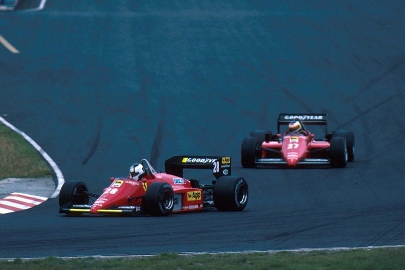 Stefan Johansson (Ferrari 156/85) leads team mate Michele Alboretto.