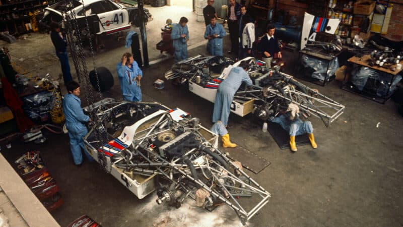 Porsche 936 cars being prepared in rented garage ahead of 1977 Le Mans 24 Hours