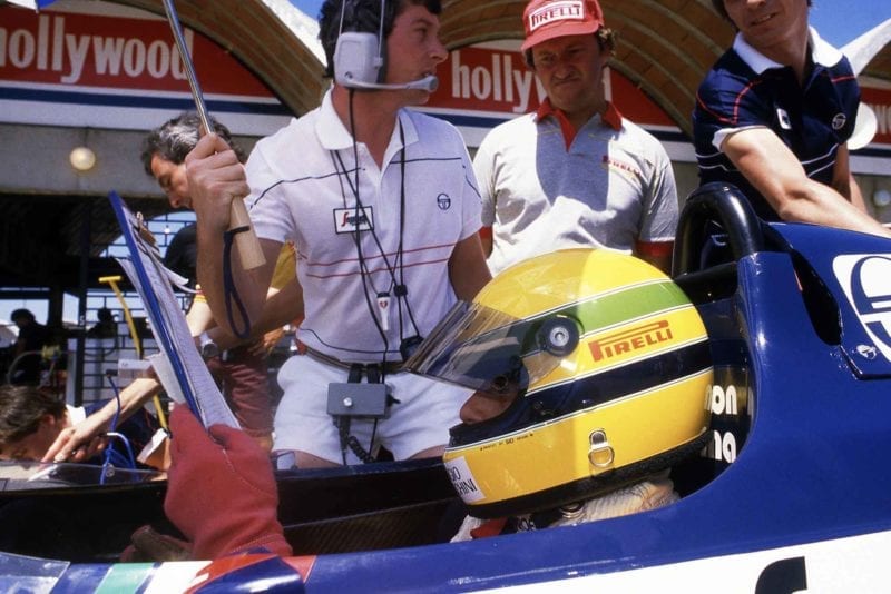 Toleman's Ayrton Senna and Pat Symonds prepare for the 1984 Brazilian Grand Prix