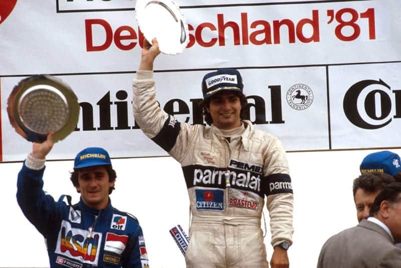 Nelson Piquet (Brabham Ford) 1st position and Alain Prost (Equipe Renault) 2nd position on the podium.