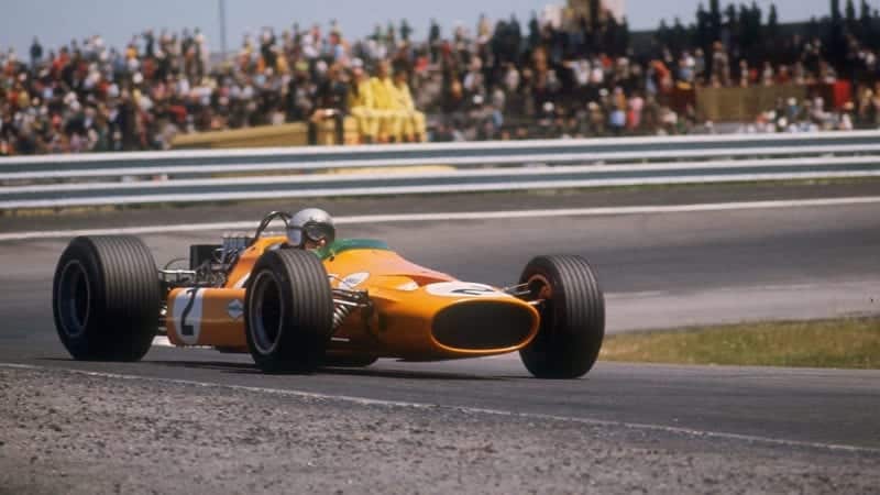 Bruce McLaren's McLaren-Ford, Spanish Grand Prix, Jarama, Madrid, 1968. McLaren retired with mechanical trouble after 77 laps of the race. New Zealander McLaren won 4 Grands Prix in a 13-season Formula 1 career, finishing second in the World Drivers' Championship in 1960. In 1966 he set up his own team bearing his name which went on to become one of the most successful constructors in the history of the sport. Unfortunately Bruce McLaren did not live to see the success of the organisation, as he was killed at Goodwood in 1970 while testing the McLaren M8D-Chevrolet Can-Am sports car. (Photo by National Motor Museum/Heritage Images/Getty Images)