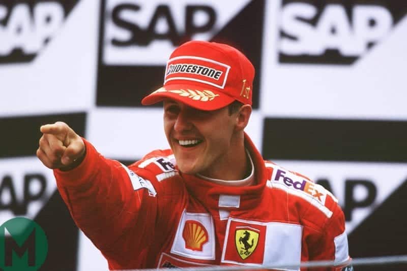Michael Schumacher celebrates victory