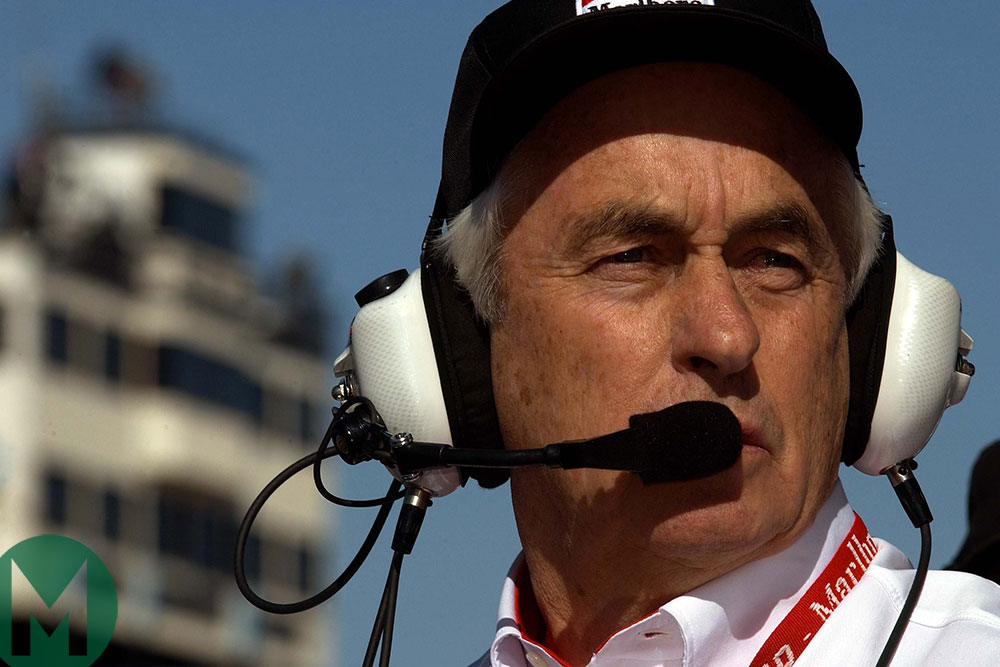 Roger Penske watches his cars in Phoenix 2002