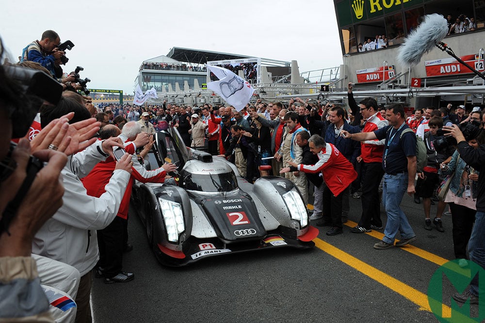 The no2 Audi takes the applause after a dramatic 2011 Le Mans victory