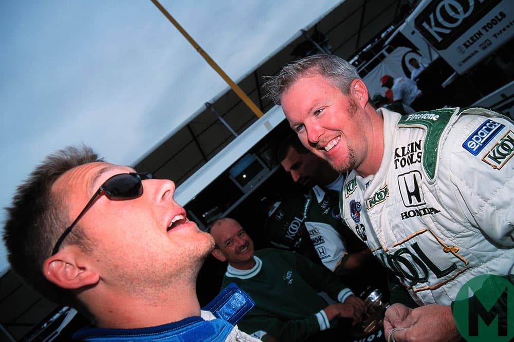 Greg Moore shares a joke with Paul Tracy at Vancouver in 1999 CART